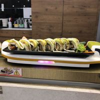 Food comes on an express train  at Saute Sushi 素特•素司 in Central Singapore