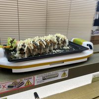 Sushi delivered via a conveyor train   at Saute Sushi 素特•素司 in Central Singapore