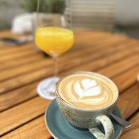 Soya cappuccino with fresh pressed orange juice  at Bruder Jakob in Sankt Wendel