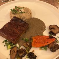 Oyster mushroom “roast” (?) with deliciously flavored shiitake mushrooms and veggies. Came with a well marinated salad    at Le Very'table  in Lunel