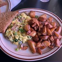 Spinach, onion, pepper, mushroom, plant based “egg”, dry whole wheat toast and potatoes  at Annette's in Salem