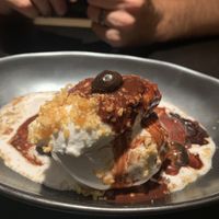 Brownie with taro ice cream, hot fudge and caramel crumbles.  at PLANTA Queen in New York City