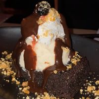 brownie with ice cream and chocolate sauce - amazing!!! at PLANTA Queen in New York City