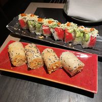 Rainbow Roll (back) Baked Crab Roll (front)  at PLANTA Queen in New York City