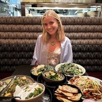 5 different meals (jackfruit, kelp noodles, Cesar salad, cucumbers, coconut chieve)  at PLANTA Queen in New York City