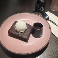 Warm brownie with vanilla ice cream and warm chocolate sauce fudge!!! Omg so good   at PLANTA Queen in New York City