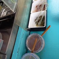 Green & red salsa. Nopales, beans & potatoes to add on top 🥄 at Taco Grass in Mexico City