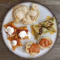 From the top clockwise: sauerkraut/mushroom, spinach/tofu, mediterranean, bravas (a previous month special) at Dvmplin in London