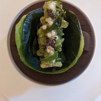 Hand held lettuce roll at Eleven Madison Park in New York City