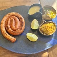 Sausage with dressings. Delicious!  at Allma Restaurante - Maybe closed in Rio De Janeiro