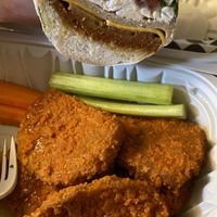 Italian sandwich (added bacon) w/Buffalo wings  at Subculture Vegan Deli & Provisions  in Albany