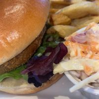 Vegan Jackfruit burger with chips and vegan coleslaw.  at The White Swan Inn in Lowick