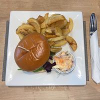 Vegan Jackfruit burger with chips and vegan coleslaw.  at The White Swan Inn in Lowick
