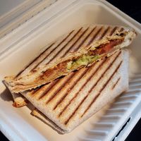 Crunchwrap perfectly pressed ♨️ at Shine On Juicery in Kill Devil Hills