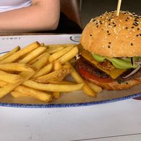 Black bean burger with vegan cheese, guacamole... and fries.  at Salt & Pepper in Medulin