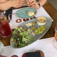 Starter plate that I was already starting... including vegan truffle cheese, guacamole, salad and smoked tofu paste  at Salt & Pepper in Medulin