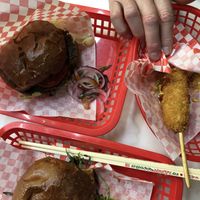 Smash burger, tofu burger, and Korean hot dog  at Kitsune Burgers in Brussels