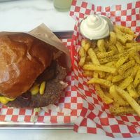 SIMPLE SMASH BURGER:
Hokkaido Buns, 1 Azuki falafel, vegan cheddar, white onions, cucumber pickles, Iceberg lettuce, mustard, Ketchup. FURIKAKE FRIES: seaweed & sesame. With Kewpie at Kitsune Burgers in Brussels
