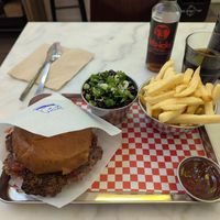 Smash burger with fries and slaw  at Kitsune Burgers in Brussels