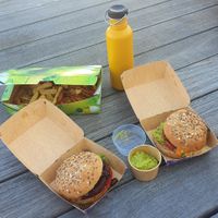 Burger + mixed fries with Avocado dip at Hans im Glück in Kiel