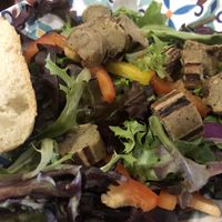 Tofurkey bratwurst over salad  at Brew & Brats in Naples