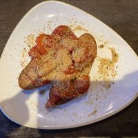 Bruschetta topped with tomatoes and crumb at The Golden Mile in Bridgend