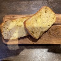 Star of the show - cheesy garlic bread. Possibly the best in the world!!  at The Golden Mile in Bridgend