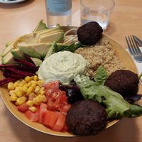 Quinoa salad + extra falafel added at A Flama in Zaragoza