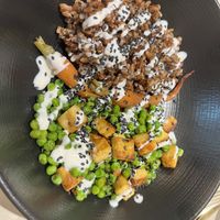 Tempeh and rice bowl in an orange dressing   at Linfa in Milan