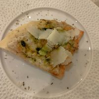 Focaccia gluten free con formaggi e pere e olio al basilico at Linfa in Milan