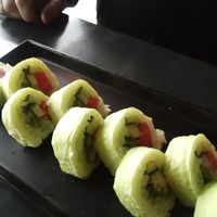 Grinch Roll vegan tuna, avocado, asparagus, cucumber wrapped in green soy paper  at Sakana in Rocky River