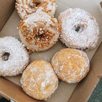 PB crunch, pina colada & passion fruit curd 🍩  at Sasparella Vegan Deli + Donut Delivery in Falmouth