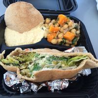 falafel with pita and sides. at Neomonde Mediterranean in Raleigh