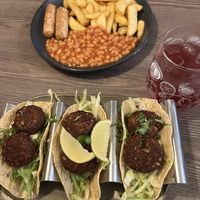 Falafel tacos and vegan sausage, chips and beans  at m'Eating Point in Llangollen