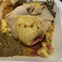 I made the bread look like that so i could take a pic of all the food underneath   at Almaz Cafe in Philadelphia