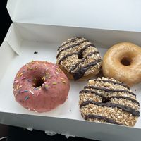 Strawberry, Samoa, and plain donuts  at Henny Penny Art Space & Cafe in Savannah
