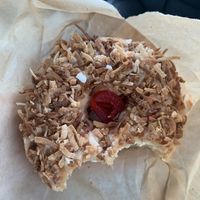 Some sort of coconut donut that was half priced because it was from the day prior  at Henny Penny Art Space & Cafe in Savannah
