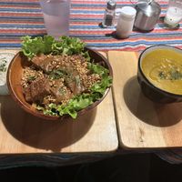 Tempeh & peanut bowl (left) and soup of the day “mixed vegetable” (right)  at Samsara's Garden in San Marcos La Laguna
