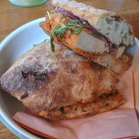Tofu with butterbean sundried tomato paste on jalapeño cheese bread 🥪 at Lisa's Deli in Zwolle
