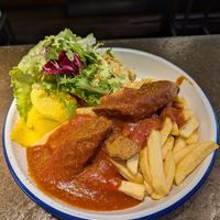 Pommes mit Currywurst at Deli in Leipzig