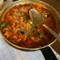 The remaining risotto after I’d served my portion. (That spoon is a huge serving spoon size not a regular spoon!) at Oštarija Peglez'n in Bled