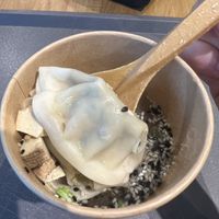 vegetarian gyoza, smoked tofu, edamame, spring onion, sesame seeds  at Poké Bistro in Bratislava