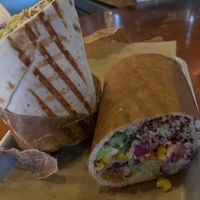 Vegan wrap with paper removed to show bread at Spitz in Portland