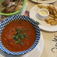 Vegan tomato soup + bread + rosemary fries with non vegan mayo🥲  at Villa Augustus in Dordrecht