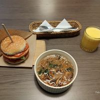 Vegan burger, tom yam soup and Fresh juice. at Veggie Bar in Minsk