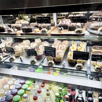 The toy cats in the display are super adorable! So many vegan items too. at Java Whiskers in London