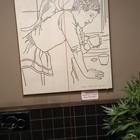 Bathroom with more art at Java Whiskers in London