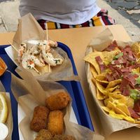 Gambas calamares croquetas y nachos at Cala Vegana in Menorca