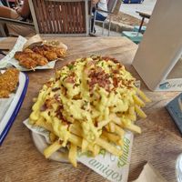 Loaded fries at Cala Vegana in Menorca