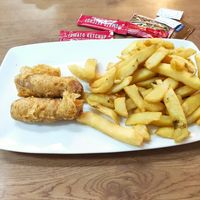 Battered sausage and chips at Barnacles in Llandudno